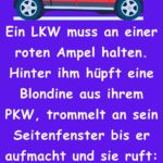 Ein LKW muss an einer roten Ampel halten