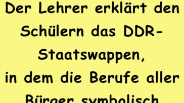 Der Lehrer erklärt den Schülern das DDR-Staatswappen